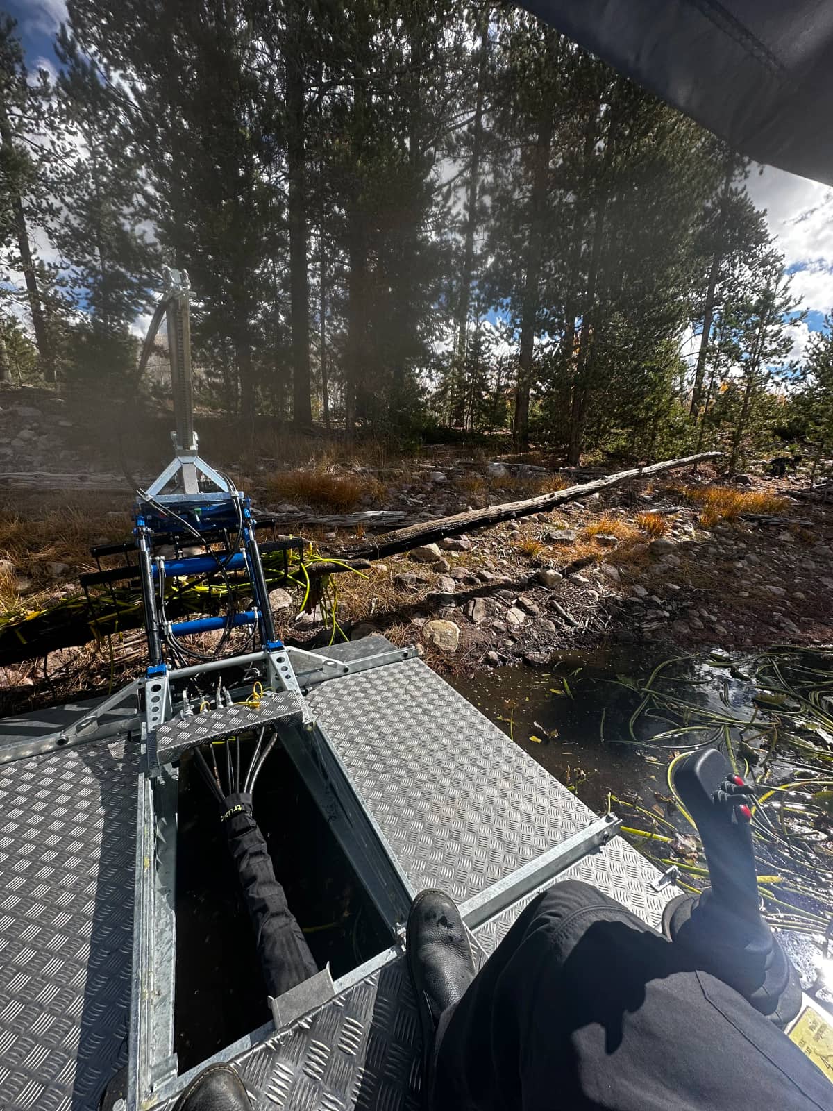 Drone flying over pond